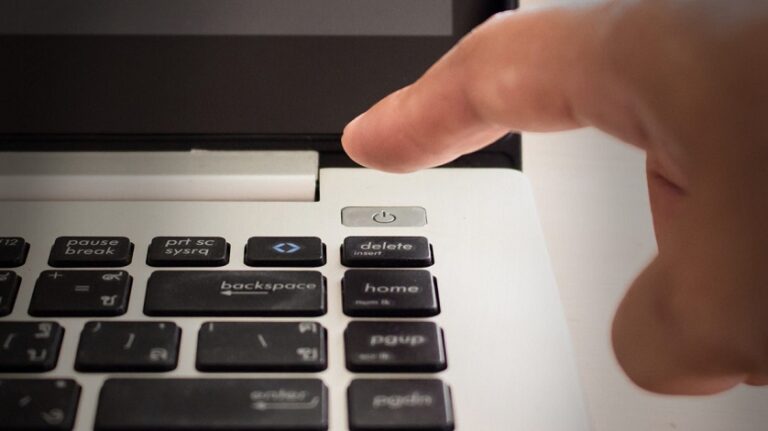 How can I turn on my laptop without the power button?