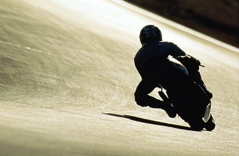 How does a motorcycle not fall when leaning?