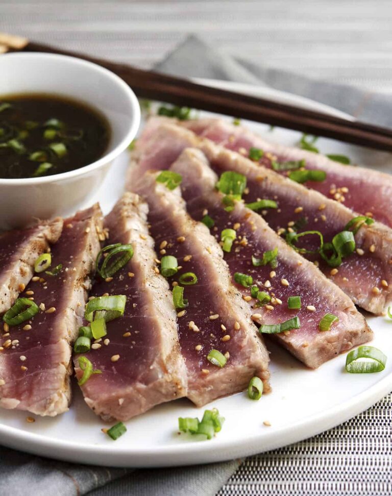 Should tuna steaks be rinsed before cooking?
