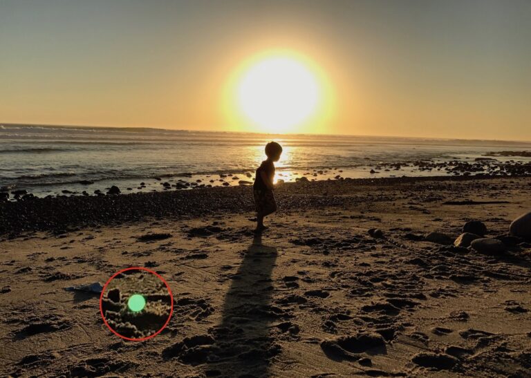 What is the green Dot in iPhone camera?