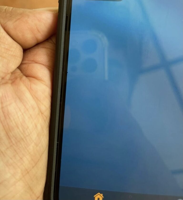 Why does a small dot appear on my iPhone?