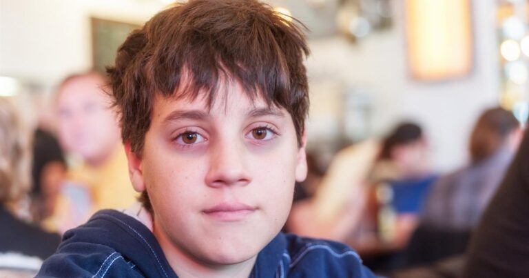 Why does my teenager have dark circles under his eyes?