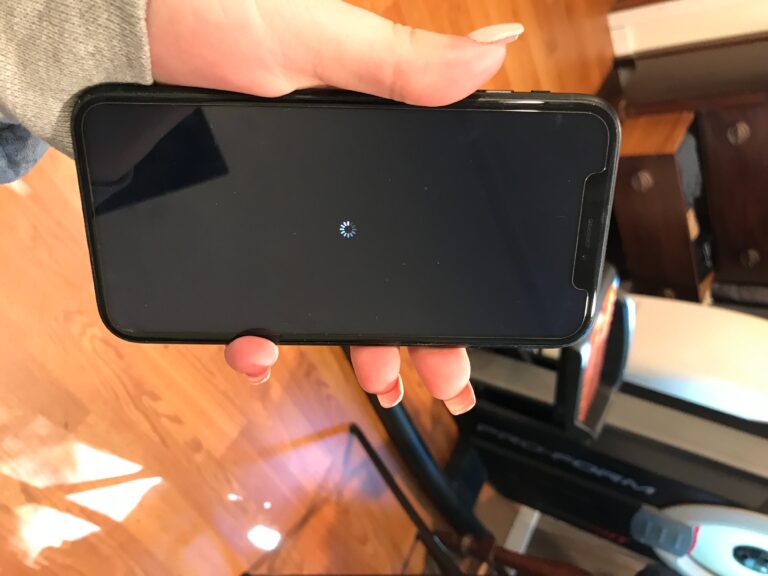 Why is my phone stuck on a spinning wheel?